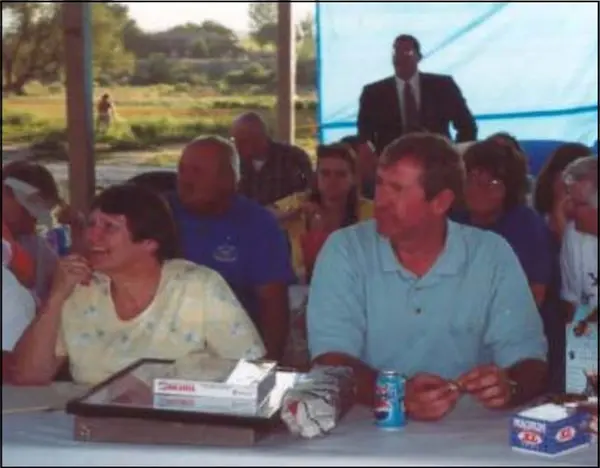 Your UVA President, Ralph Gale & his wife Janine look on as their son Jon takes on the task of auctioneer. (ed note; I was glad to be able to finally
