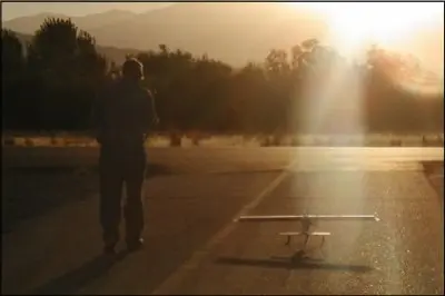 Dan Pierce shown taxing his Duraplane into the setting sun at The Lehi Field