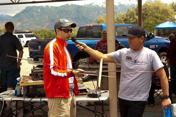 Darin our MC gives an interview about a discus-launch glider.