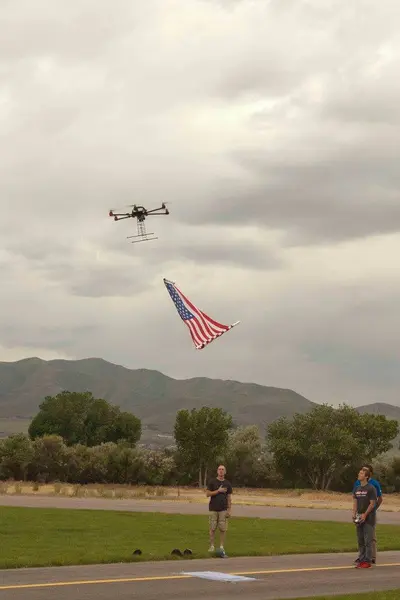 Flag raising in a stiff breeze!