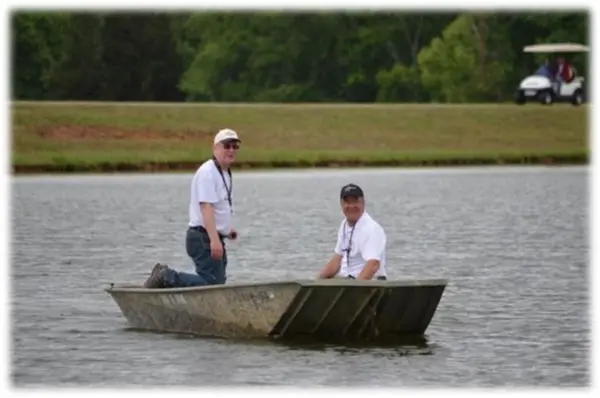 John and Charles captaining the Boat of Shame!
