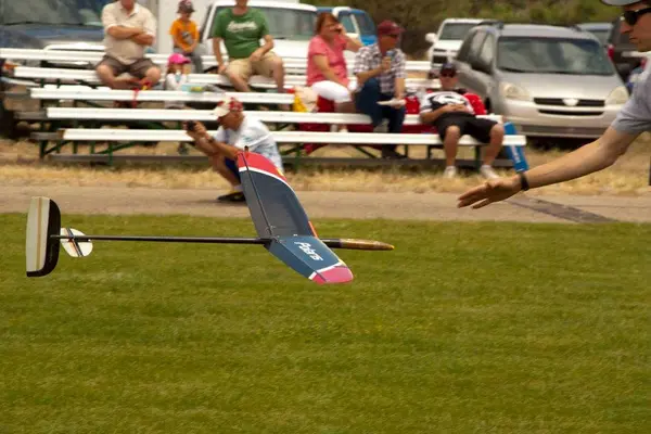 Discus launch glider (DLG) about to be caught in mid-air.